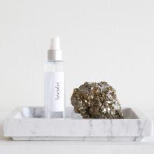 white tray and pyrite and handsanitizer